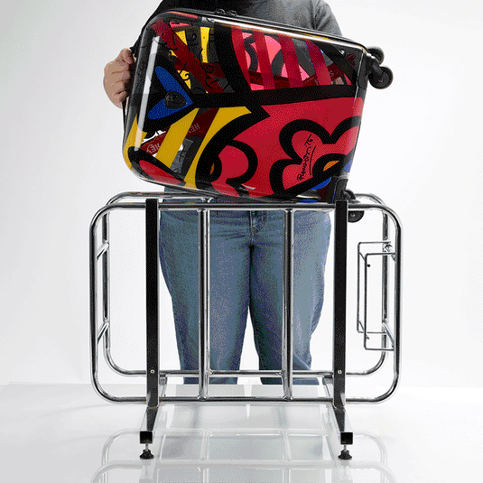 Britto - A New Day Transparent 21" Carry On Luggage being stored | 21 Carry On Luggage